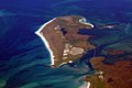 Image 21Aerial view of the low-lying island of Berneray in the Outer Hebrides, known for its sandy beaches backed by machair Credit: Doc Searls