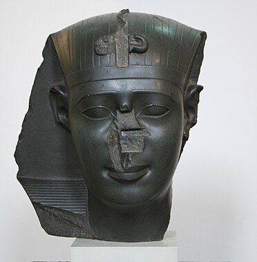 Room 4 - Green siltstone head of a Pharaoh, 26th-30th Dynasty, 600-340 BC