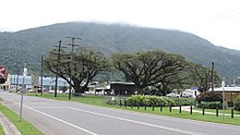 Butler Street, Tully, with Mount Tyson in the background with low cloud, 2016