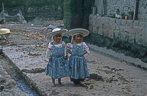 Two Otavalo girls in Cayambe, Ecuador
