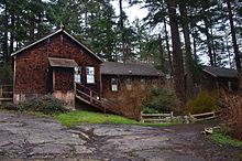 Cabins that housed those that protected the coast from the Japanese in World War 2 Cabins in Lighthouse Park.jpg