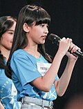 Caithlyn Gwyneth Santoso, who until 2022 is the latest-born JKT48 member. She entered the group when she was 10 and graduated just 15 days before her 12th birthday. Caithlyn Gwyneth Santoso 01Dec19 IMG 3683.jpg