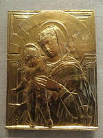 Donatello, Madona cu Pruncul în relief presat.