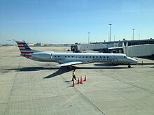 An American Eagle aircraft in new livery at Tulsa International Airport Embraer ERJ 145 (American Eagle) at TUL.jpg