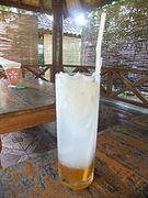 Iced young coconut water with honey