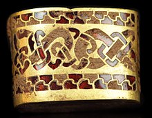c. 7th century AD, Anglo-Saxon seax hilt fitting - gold with gemstone inlay of garnet cloisonne. From the Staffordshire Hoard, found in 2009, and not fully cleaned Flickr - portableantiquities - Hilt Fitting.jpg