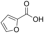 Structural formula of 2-furancarboxylic acid