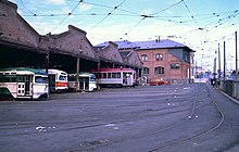 The old Geneva Car Barn on its final day of operation: September 19, 1982 Geneva Car Barn from northeast corner on Sep. 19, 1982.jpg