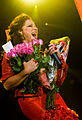 Gloria Estefan receiving flowers for her birthday at her show in the Ahoy Rotterdam, September 1, 2008