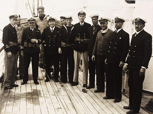 The crew of HMS Castle Harbour, assigned to the Royal Naval Dockyard in the Imperial fortress colony of Bermuda as the Examination Service vessel (tha