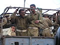 Indian soldiers in a back of truck.jpg
