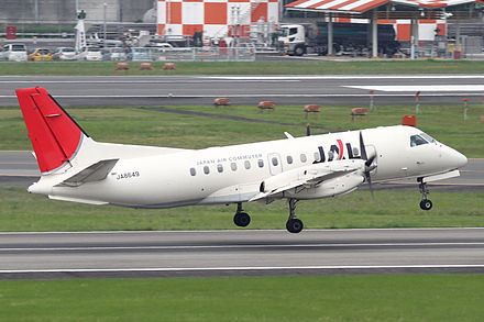 A Japan Air Commuter Saab 340 departs Osaka International Airport, Japan (2010).