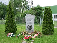 Memorial stone with wreaths