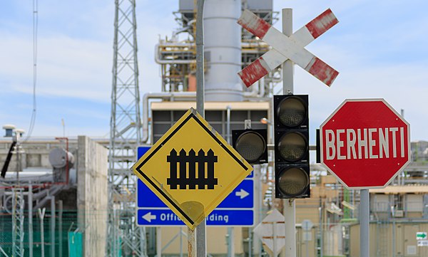 A Malay traffic sign in Malaysia.