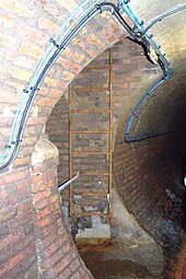 Photo of the interior of a combined sewer in Brighton, England. Manhole Brighton.jpg