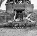 Monnikmolen "De Keimptilstermolen", achterzijde van de molen met de vijzel - Dronrijp - 20064733 - RCE.jpg