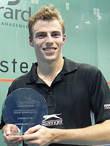 Nick Matthew holding his 2006 British Grand Prix Squash Championships trophy Nick Matthew British Grand Prix.jpg