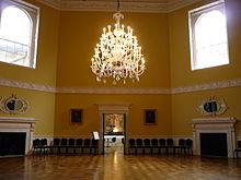 The Octagon Room, with a central chandelier Octagon Room.jpg