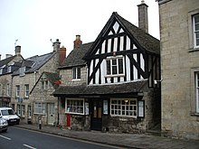 The half-timbered building containing the Painswick post office was built in 1478. Painswick Post Office.jpg