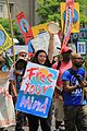 People's Climate March 2017 in Washington DC 29 - Young woman marcher with sign, "Free your mind" and a tambourine.jpg