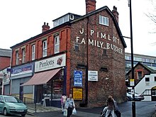 Pimlott's butcher shop, on Station Road. It was established in 1869, and is one of the family-run businesses in the area.[citation needed]