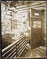 Portrait of an unidentified woman seated on a porch rail, ca. 1918-1920. (9564170174).jpg