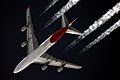 "Qantas_Boeing_747-400_VH-OJU_over_Starbeyevo_Kustov.jpg" by User:Russavia