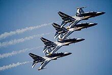 The Black Eagles performing during Air Power Day 2016 over Osan Air Base. Republic of Korea Air Force Black Eagles fly in formation during Air Power Day 2016 on Osan Air Base, Republic of Korea, Sept. 25, 2016..jpg