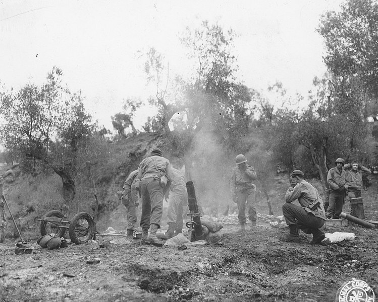 File:SC 336791 - Company B, 2nd Chemical Bn. The mortars are fired. The team is well trained and can fire 20 rounds a minute. Cassino area, Italy. 6 March, 1944. (52206713585).jpg