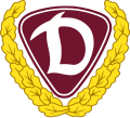 O emblema da sociedade desportiva "Dynamo", RDA