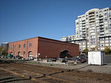 In the 1920s, this building between Broad and Clay Streets is where I. F. Laucks manufactured Lauxein. Since 1974, it has been a restaurant called the Old Spaghetti Factory. Seattle - Old Spaghetti Factory 01.jpg