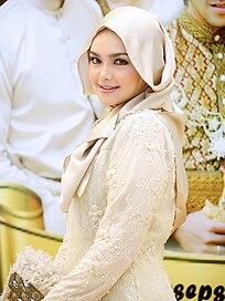 Siti Nurhaliza attending the wedding of a Malaysian footballer, Khairul Fahmi Che Mat on January 13, 2013 at Hotel The Royale Bintang, Damansara, Kuala Lumpur, Malaysia.