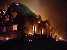 The historic Sperry Chalet was nearly destroyed by the Sprague Fire Sperry Chalet on fire.jpg