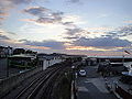 The sun setting at the Esplanade, Ryde, Isle of Wight, viewed from the pedestrian walkway over the railway line in June 2012.