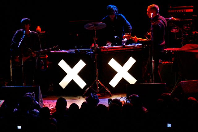 After Qureshi's departure, the xx toured as a trio (pictured in December 2009).