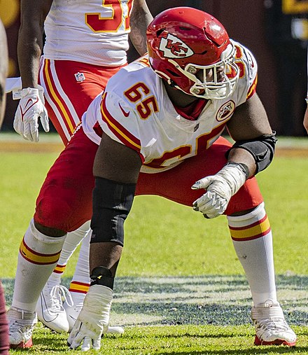 Kansas City Chiefs offensive lineman Trey Smith in a three-point stance.