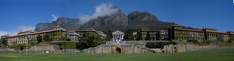 Upper Campus seen from the rugby fields that separate it from Middle Campus, with Devil's Peak in the background UCT cropped panorama.jpg