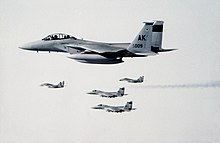 43rd Tactical Fighter Squadron F-15s escort Soviet Air Forces MiG-29s on their visit to America. US F-15s and Soviet MiG-29s over Alaska 1989.JPEG