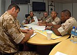 Thumbnail for File:US Navy 070529-N-0448N-023 Combined Task Force (CTF) 158 command and control center afloat forward staging base, known as Ocean 6, and CTF 59 discuss ways to resolve an oil spill.jpg