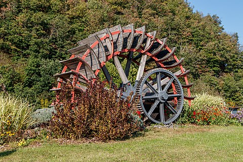 Water wheel in the center of a roundabout, Zell am Harmersbach, Germany