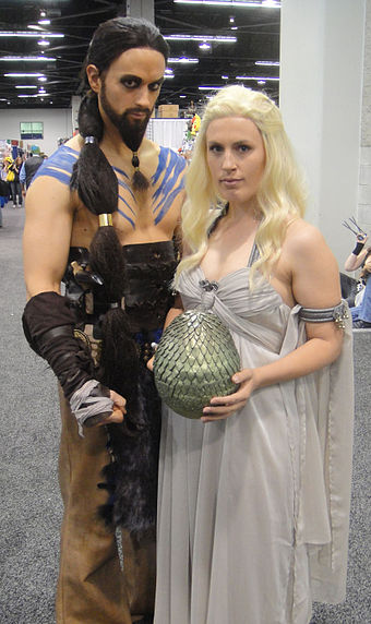 Two fans costumed as Khal Drogo and Daenerys Targaryen. Cosplay is a popular activity at fan conventions.