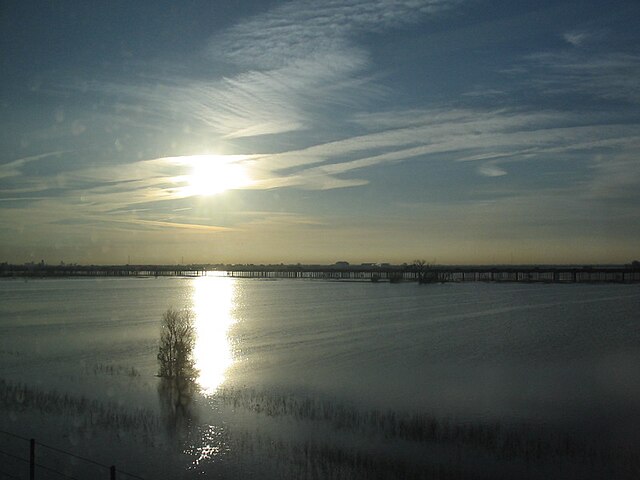 Flooded Yolo Bypass, February 2006. Interstate 80 runs along the causeway in the distance.