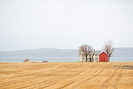 A farm in the characteristic flat landscape of Ørland