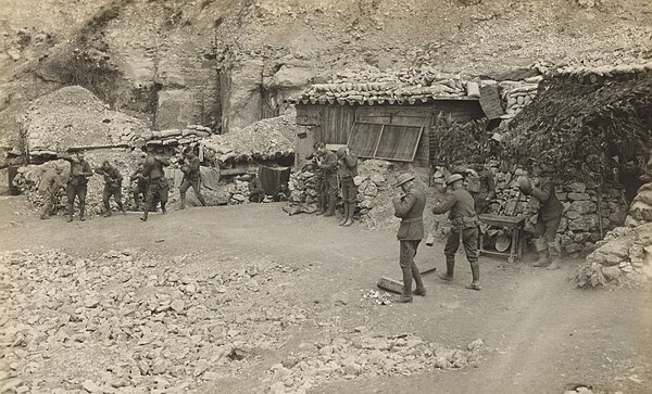 Men of the 6th Marine Regiment at the front, responding to a gas alarm at Verdun, France, April 30, 1918.