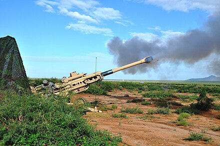 2/1 AD soldiers firing the M777 Howitzer at White Sands Missile Range. (Photo By Wes Elliott, U.S. Army) 2010-07-27 - M777 Firing 069.jpg