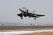 F-4E 60-504 (ex-USAF 76-0504) of the 153rd TFS at Suwon Air Base, 2011 2011nyeon 1weol gonggun F-4E iryug mic jeongbi(7) (7499852630).jpg