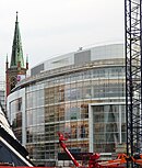 2019-07-25, Johanneskirche hinter Peek & Cloppenburg in Dusseldorf mit Baumaschinen des Ingenhoven-Tals.jpg