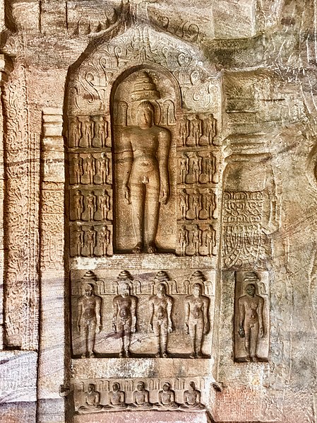 File:7th - 12th century Mahavira flanked by 24 Tirthankaras in Cave 4, Badami Jain cave temple Karnataka.jpg