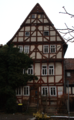 English: Half-timbered building in Alsfeld Kirchplatz 10 / Hesse / Germany This is a picture of the Hessian Kulturdenkmal (cultural monument) with the ID 13106 (Wikidata)
