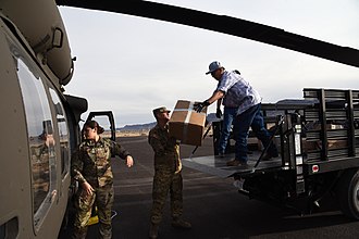 Arizona National Guard members transporting medical PPE to Kayenta on March 31, 2020, in response to COVID-19. Arizona National Guard - 49724556663.jpg